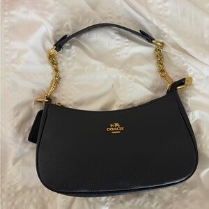 Coach Black Leather Shoulder Bag with Gold Chain Accents